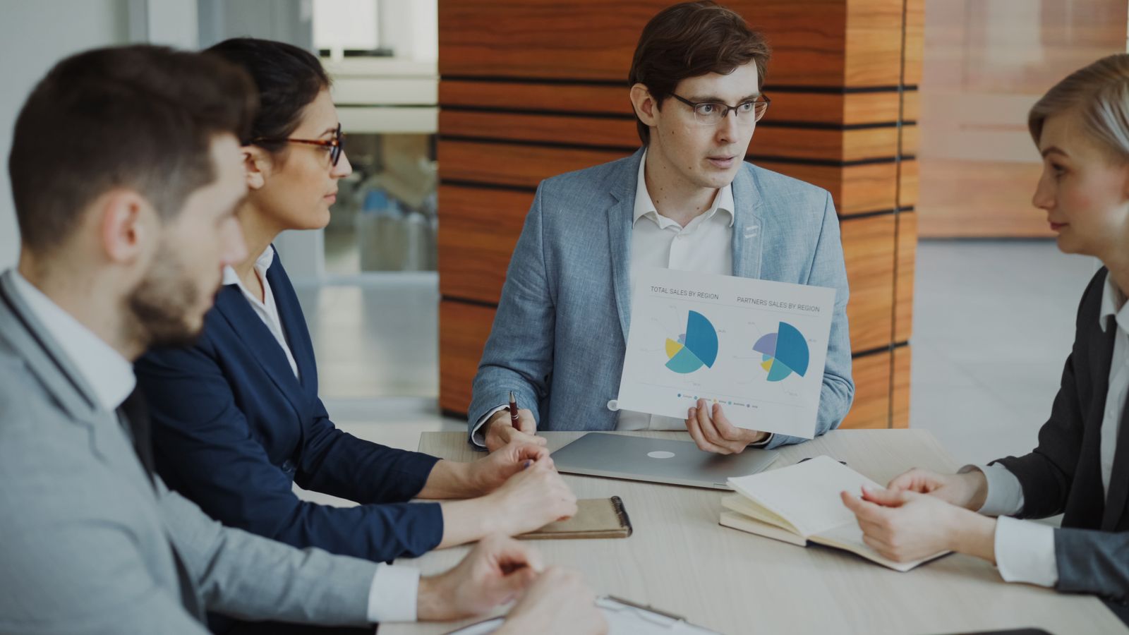Corporate attorneys collaborating in a conference room