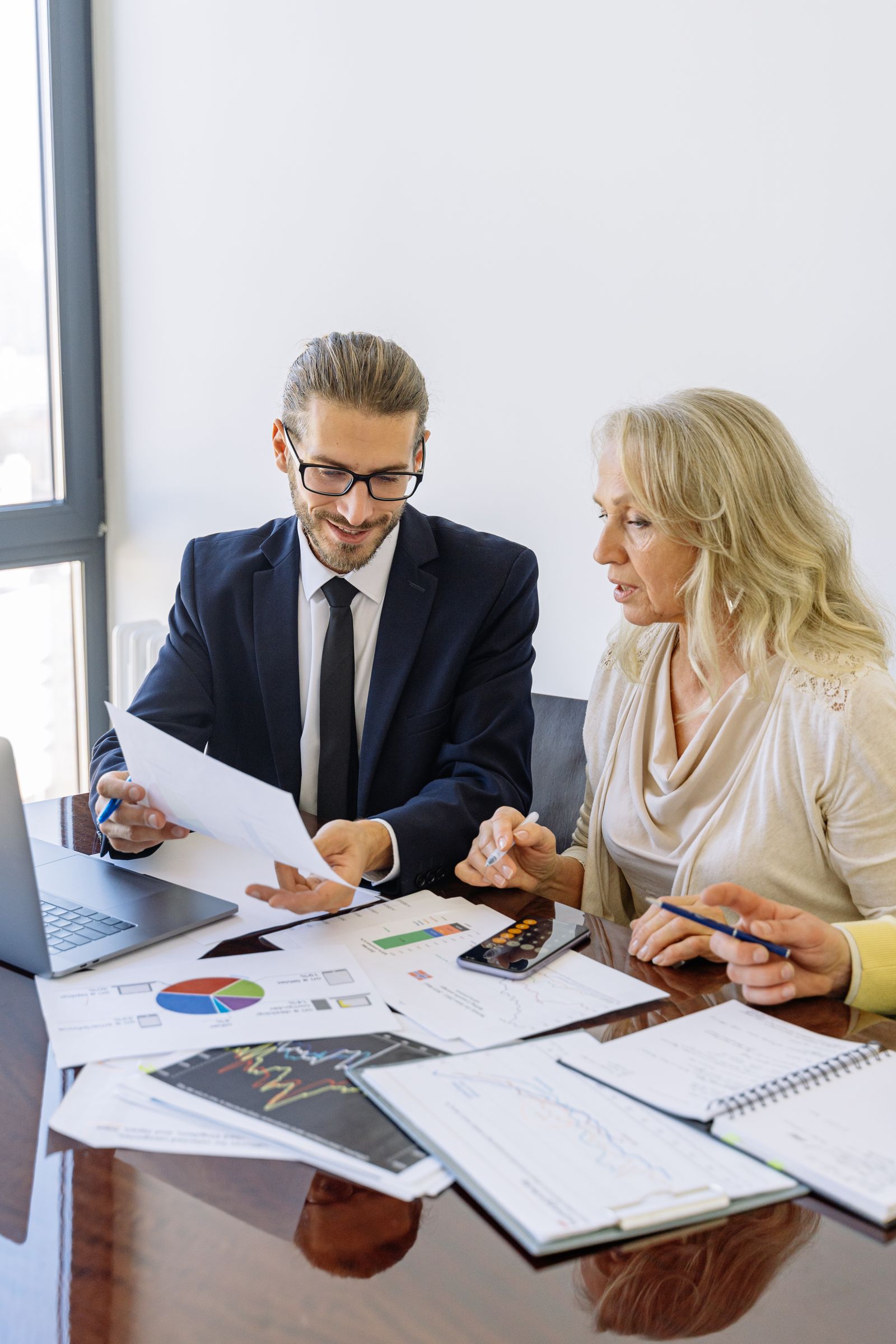 Attorney reviewing documents with a client